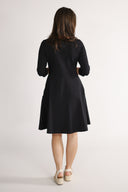 Denise's black dress