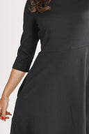 Denise's black dress
