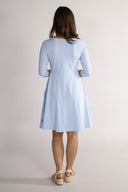 Denise's sky-blue dress