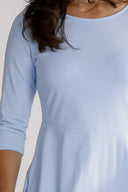 Denise's sky-blue dress
