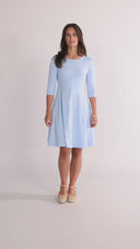 Denise's sky-blue dress